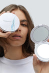  Keep your makeup in check with our premium compact LED mirror, featuring a sleek flip case design with two mirrors. Perfect for quick touch-ups on the go. Its compact size makes it easy to carry around in a handbag. Featuring a x5 magnifying mirror and equipped with a bright LED light ring around the bottom mirror that illuminates by a flip of the on/off switch, giving you light when ever you need it. Removable battery included.